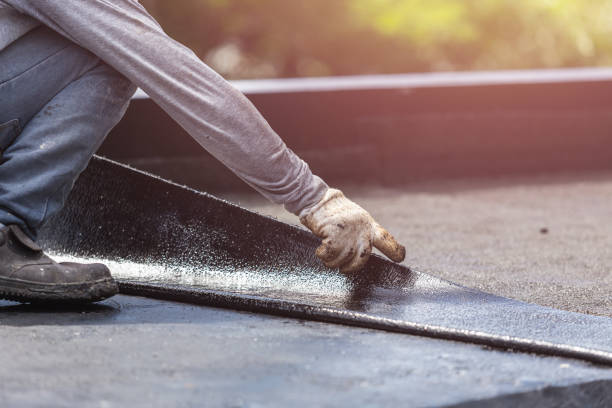 Professional Waterproofing technician working in Belfast, NY